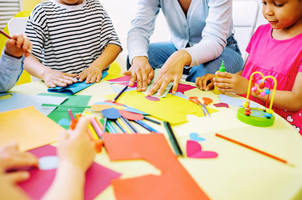 Fine motor development ages 3-5 years old preschoolers cutting and folding paper